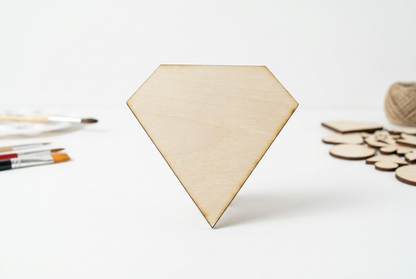 Basswood diamond cut-out in a bright white craft studio