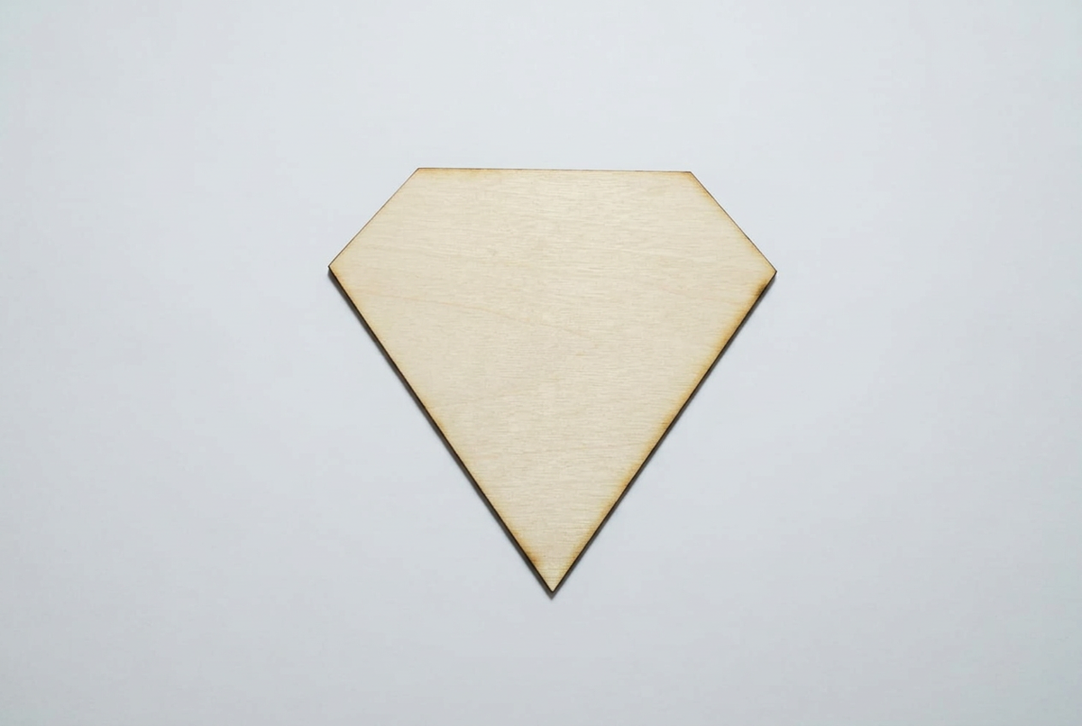 Diamond-shaped craft cut-out with a natural basswood appearance